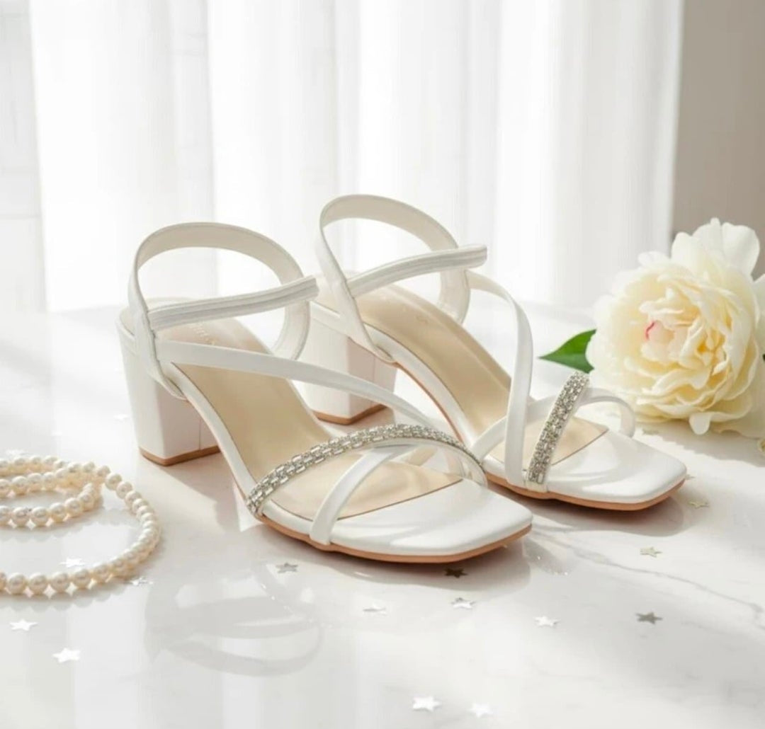 Seraphina Crystal Strappy Block Heels
The Vibe: Elegant, timeless, and romantic.